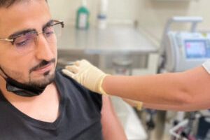 Raamish-Siddiqui-receiving-his-second-shot-of-covid-vaccine